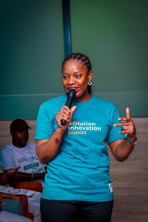 Chinwe Okoli speaking at Solution Innovation District (SID)